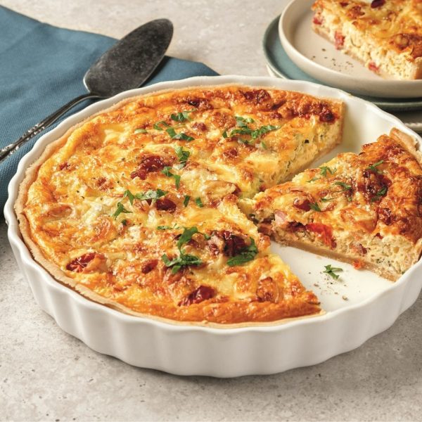 Quiche au prosciutto, pancetta, poireaux et fromage