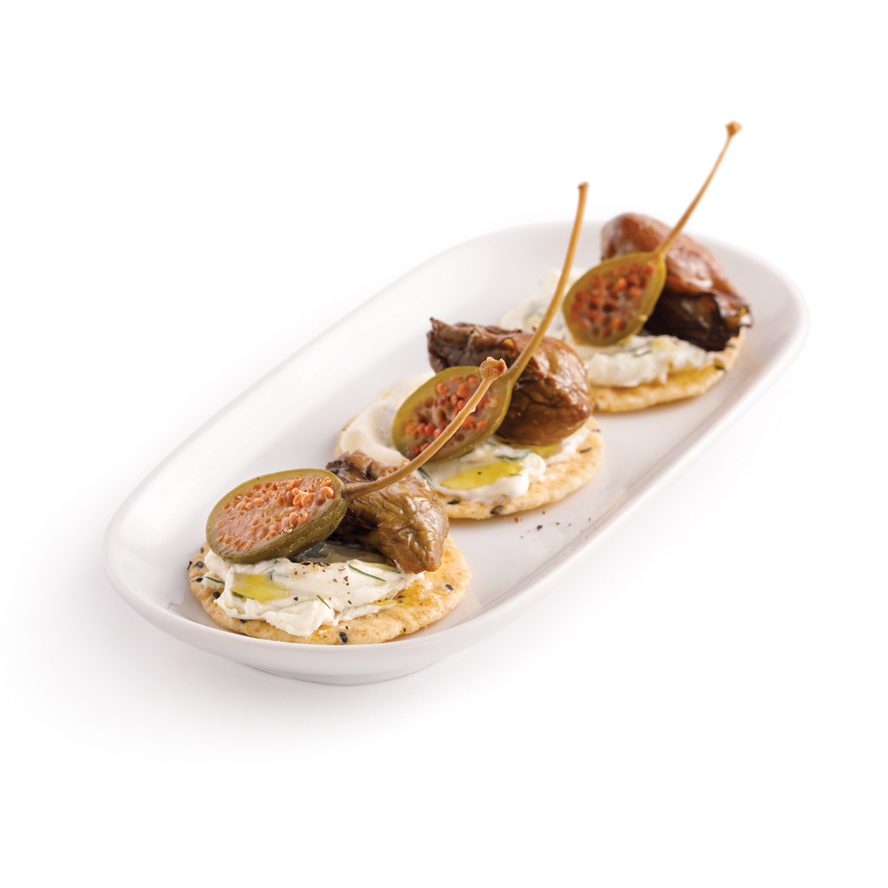 recettes de la mer de craquelins garnis d'huîtres fumées et de mousse au fromage